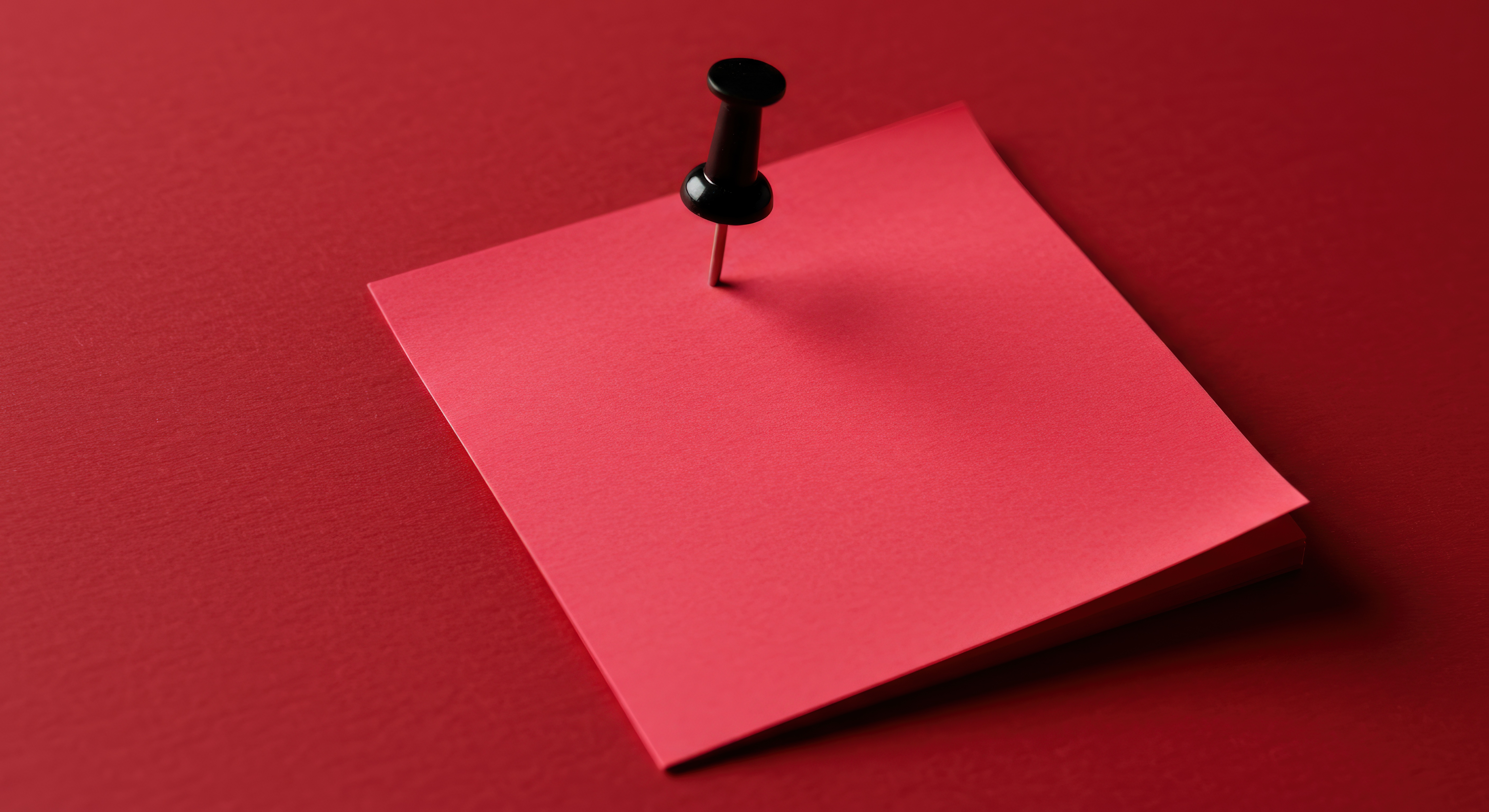 vecteezy_red-paper-note-pinned-on-matching-background_72460140.jpg